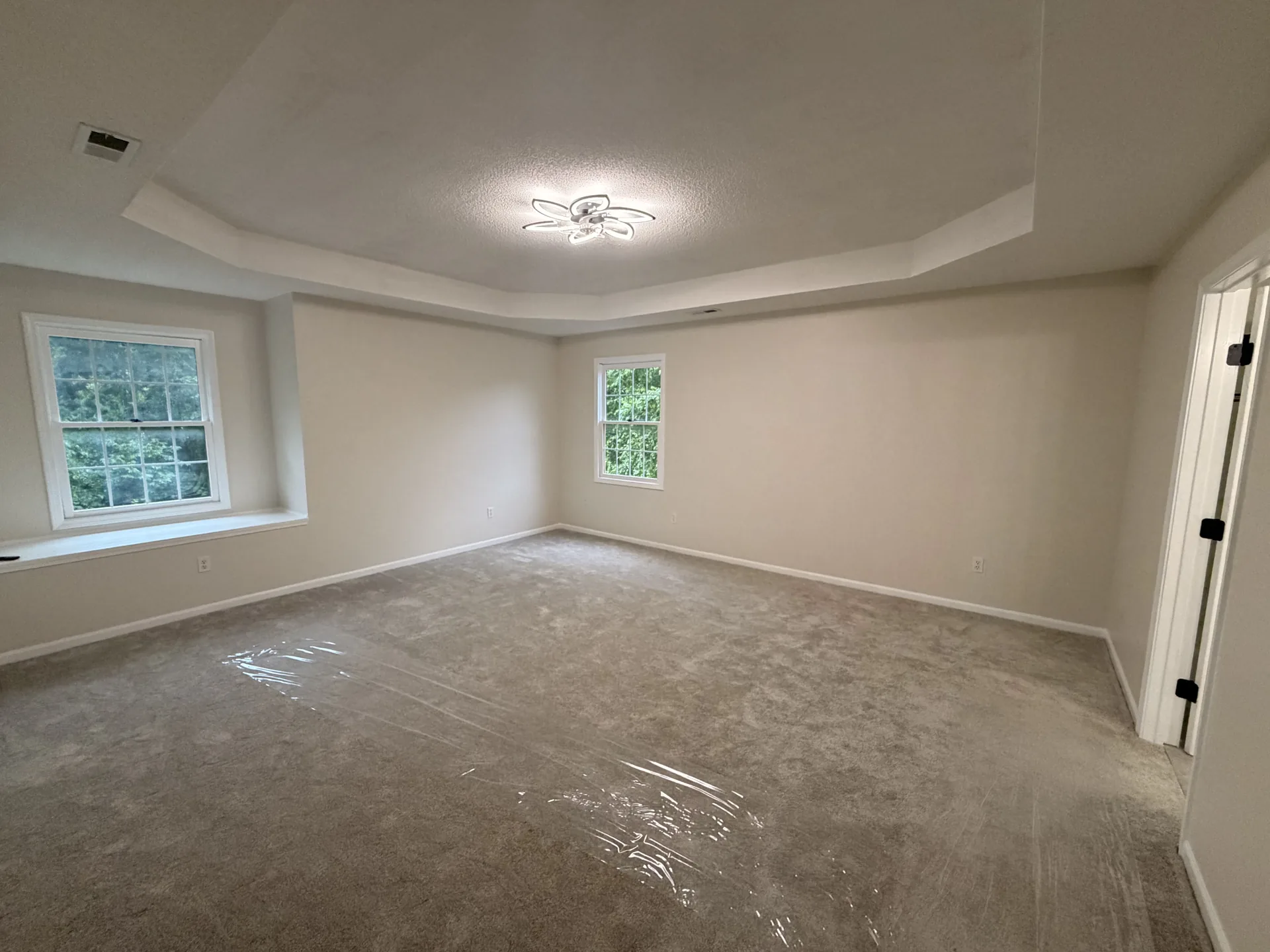 Primary bedroom before staging